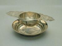 A Walker & Hall silver tea strainer and stand