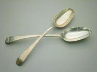 A pair of Old English pattern dessert spoons