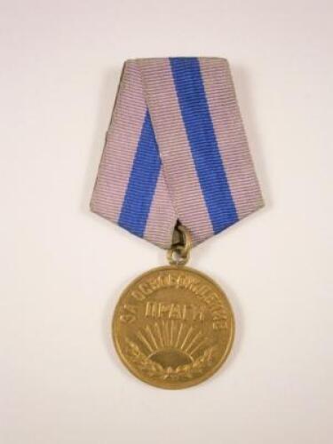 A Russian gilt metal medal awarded for the Liberation of Prague