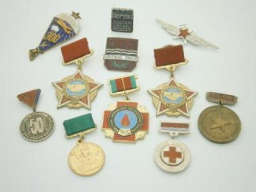 A group of Russian medals and badges