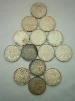 Fourteen Latvian five Lati coins