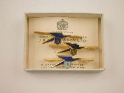 Three silver gilt industry presentation tie pins