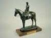 A bronzed resin figure of Queen Elizabeth II on horseback