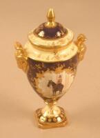 A Coalport porcelain two handled vase and cover