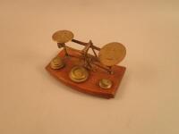 A set of late Victorian/ early 20thC brass letter scales