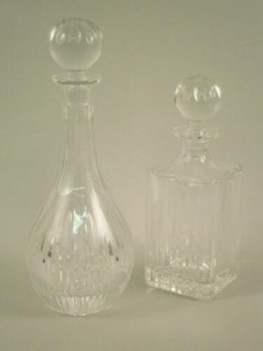 Two cut glass decanters and glass stoppers