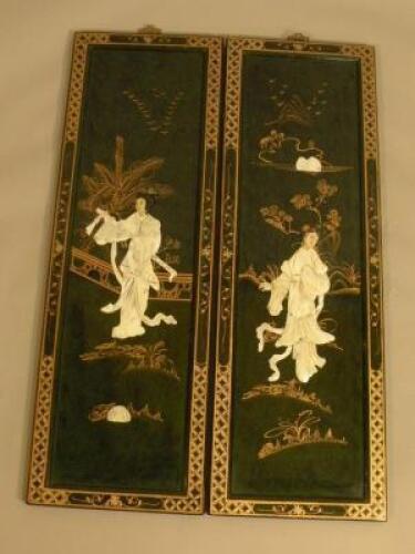 A pair of modern oriental lacquered and mother of pearl inlaid panels