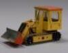 A Dinky die-cast shovel dozier