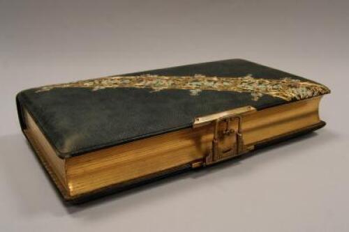 A late 19thC early 20thC leather bound photograph album