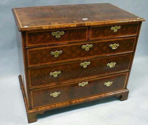 A William & Mary laburnum oyster veneered chest of 2 short and 3 long