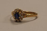 An 18ct gold cluster ring