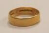 An 18ct gold wedding band