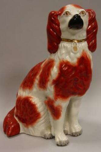 A large 19thC Staffordshire comforter dog Spaniel