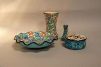 Four pieces of Longwy enamelled pottery.