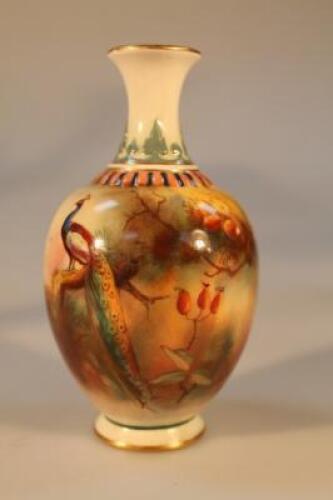 A Royal Worcester porcelain baluster vase