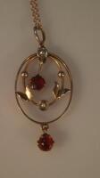 An Edwardian pendant and chain