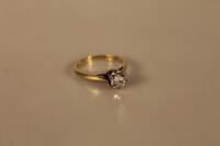 An 18ct gold diamond solitaire ring