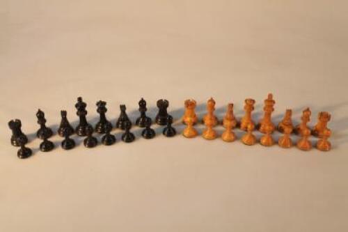 A turned wood chess set