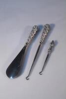 Two late Victorian silver handled shoe horn and button hook