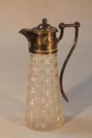 A late Victorian silver plated cut glass claret jug