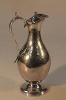 A silver plated claret jug