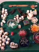 A collection of pottery thimbles