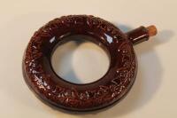 A 19thC treacle glazed circular flask (AF)