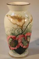 An early 20thC large vase painted with flowers