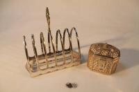 An electroplated seven-bar toast rack by Walker & Hall