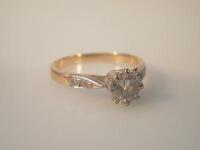 A diamond solitaire ring