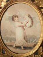 A 18thC style needlework silk picture of a mother and child before a cottage