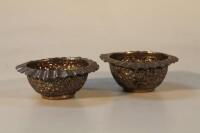 A pair of Indian white metal bowls