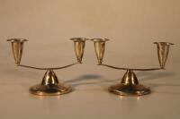 A pair of Elizabeth II silver two branch candelabrum