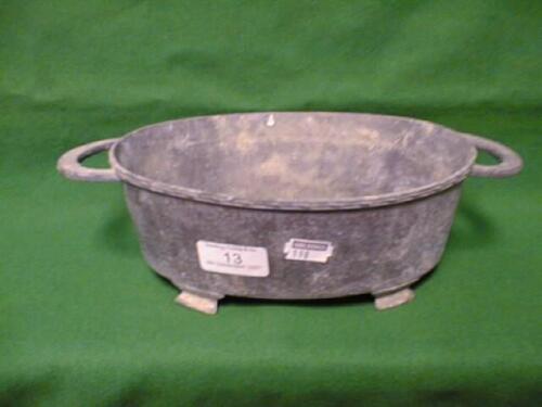 An Arts & Crafts hammered pewter small jardiniere