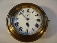 A 19thC brass cased circular wall clock