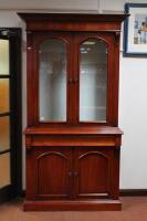 A reproduction 19thC style bookcase cabinet