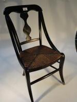 A 19thC rush seated child's chair.