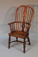 A 19thC Windsor high back armchair (AF).