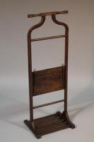 An early 20thC coat hanger and trouser press. 114cm high