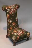 A Victorian Prie dieu prayer chair.