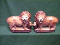 A pair of 19thC Staffordshire lions