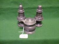 A pewter pepper, salt and mustard by James Yates, each of baluster form, on circular foot