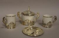 A cased bone china and silver plate mounted coffee service.