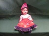 A celluloid gypsy doll with closing eyes