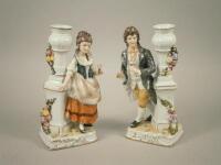 A pair of porcelain candlesticks