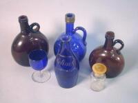 Various 19thC and later claret jugs etc and a small glass.