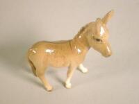 A Beswick figure of a donkey foal