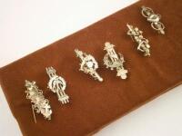 Six Victorian brooches.