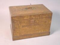 An Edwardian oak work box