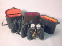 Three pairs of binoculars